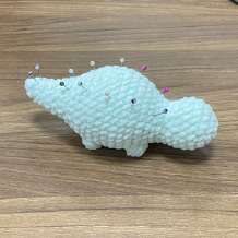 Stegosaurus step photo: pins mark the plate lines